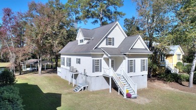 This charming lakefront cottage has new HVAC units and was built - photo 8
