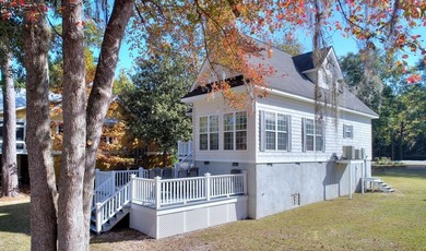 This charming lakefront cottage has new HVAC units and was built - photo 10
