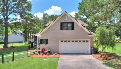 Location!! Location!! Location!! This spacious brick home with a - photo 6