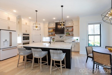 Meticulously designed home with thoughtful details inside and - photo 5