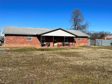 COUNTRY LIVING MINUTES FROM TOWN!  - Lake Home For Sale in Checotah, Oklahoma