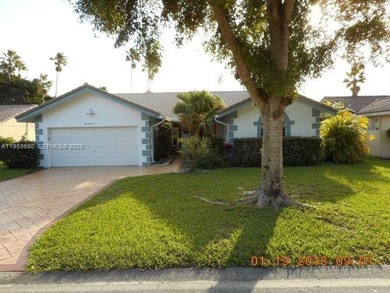 (private lake, pond, coastal) Home Sale Pending in Coral Springs Florida