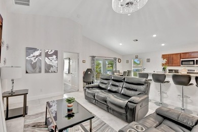 This charming 3-bedroom, 2-bath home offers a spacious open - photo 11