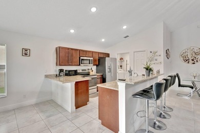 This charming 3-bedroom, 2-bath home offers a spacious open - photo 14