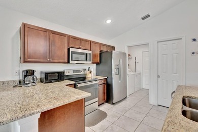 This charming 3-bedroom, 2-bath home offers a spacious open - photo 15