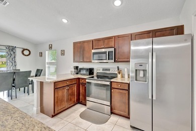 This charming 3-bedroom, 2-bath home offers a spacious open - photo 18