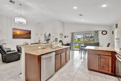 This charming 3-bedroom, 2-bath home offers a spacious open - photo 19