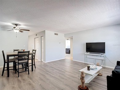 Discover this charming 2 bedroom, 1 bathroom condo perfectly - photo 2