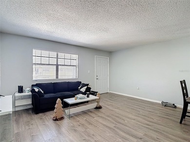 Discover this charming 2 bedroom, 1 bathroom condo perfectly - photo 4