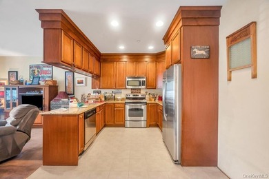 Welcome to maintenance-free living at 305 Okeefe Court in - photo 11