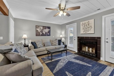 This adorable furnished condo has been remodeled and is in - photo 1