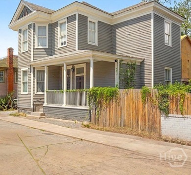 This Wonderfully Updated Duplex is being offered for sale - photo 2
