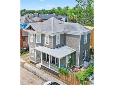 This Wonderfully Updated Duplex is being offered for sale - photo 3
