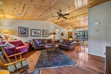 Tucked away in the tall pines of Pineridge, this beautifully