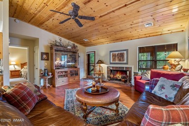 Tucked away in the tall pines of Pineridge, this beautifully