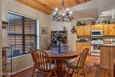 Tucked away in the tall pines of Pineridge, this beautifully