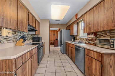 An easy walk to the beach from this spacious, well-maintained - photo 14