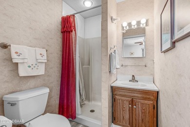 An easy walk to the beach from this spacious, well-maintained - photo 31