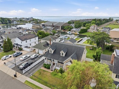 Welcome to 34 Meadow Lane in Amityville. This expansive - photo 33