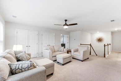 Situated on a premium pond lot, this stunning home is located - photo 20