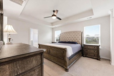 Situated on a premium pond lot, this stunning home is located - photo 25