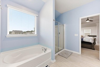 Situated on a premium pond lot, this stunning home is located - photo 29