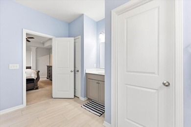 Situated on a premium pond lot, this stunning home is located - photo 30
