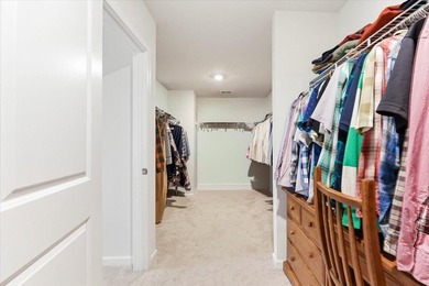 Situated on a premium pond lot, this stunning home is located - photo 31
