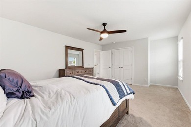 Situated on a premium pond lot, this stunning home is located - photo 35