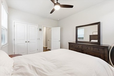 Situated on a premium pond lot, this stunning home is located - photo 38