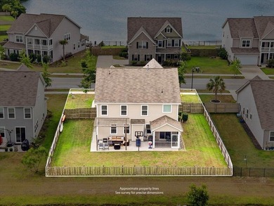 Situated on a premium pond lot, this stunning home is located - photo 45