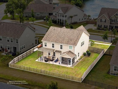 Situated on a premium pond lot, this stunning home is located - photo 47