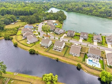 Situated on a premium pond lot, this stunning home is located - photo 50