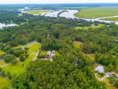 Nestled among majestic live oaks and the natural beauty that - photo 9