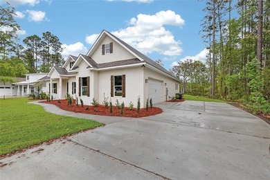 Located in the gated Palmetto Point subdivision on Buckswamp - photo 3