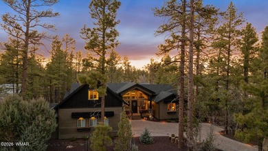 Nestled among towering ponderosa pines on two lots in the - photo 1