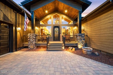 Nestled among towering ponderosa pines on two lots in the - photo 4
