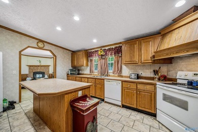 Tucked away near Weiss Lake, this home offers the kind of - photo 11