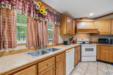 Tucked away near Weiss Lake, this home offers the kind of - photo 12