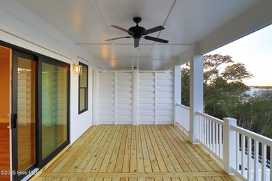 Experience refined coastal living in the heart of Emerald Isle