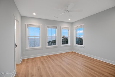 Experience refined coastal living in the heart of Emerald Isle