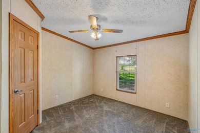 Tucked away near Weiss Lake, this home offers the kind of - photo 16