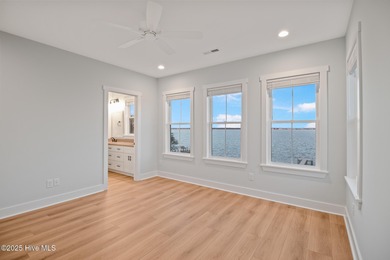 Experience refined coastal living in the heart of Emerald Isle