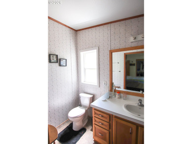 Nestled along the scenic Oregon Coast, this charming 2-bedroom - photo 17