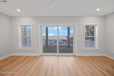 Experience refined coastal living in the heart of Emerald Isle