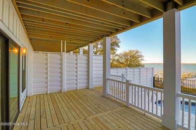 Experience refined coastal living in the heart of Emerald Isle