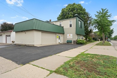 The main level offers 1,365 square feet, providing four offices - photo 3