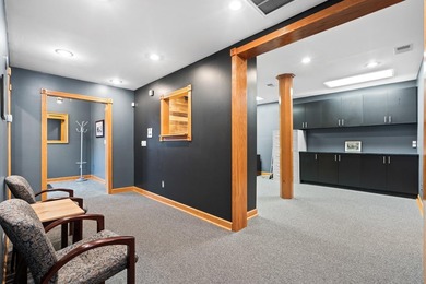 The main level offers 1,365 square feet, providing four offices - photo 5