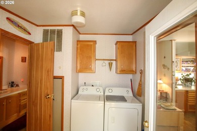 Nestled along the scenic Oregon Coast, this charming 2-bedroom - photo 25
