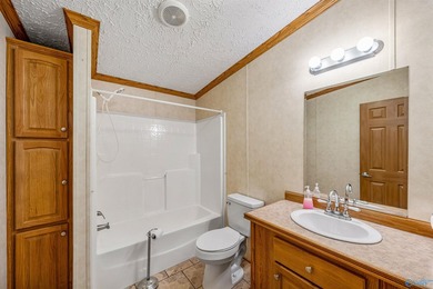 Tucked away near Weiss Lake, this home offers the kind of - photo 26